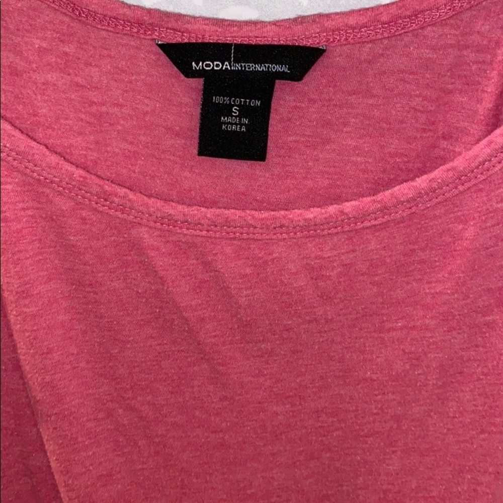 MODA INTERNATIONAL, Top